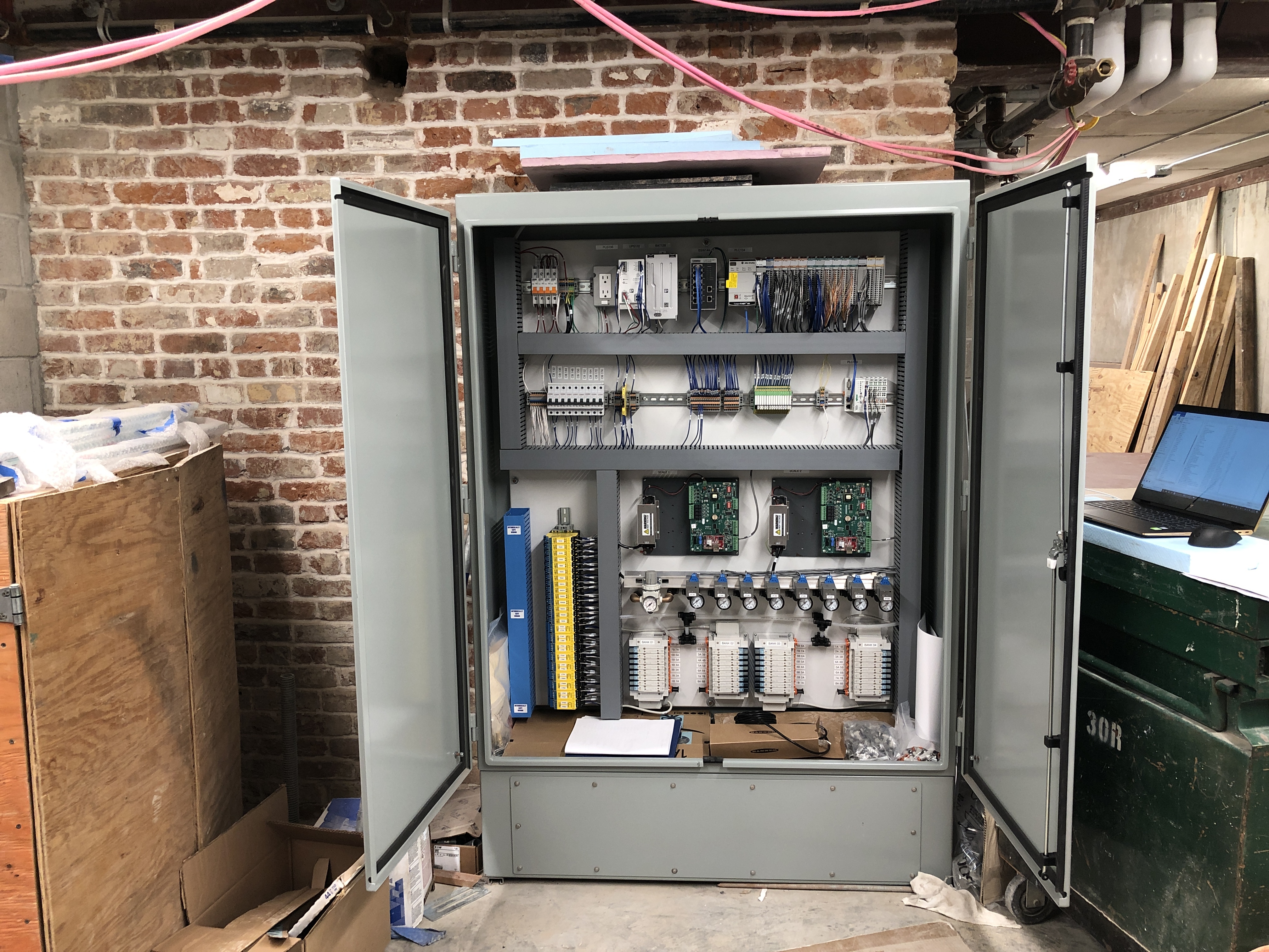 Distillery control panel with Allen-Bradley PLC, Intrinsic Safe Barriers, SMC Solenoid Manifolds and Rice Lake Scale Interface.